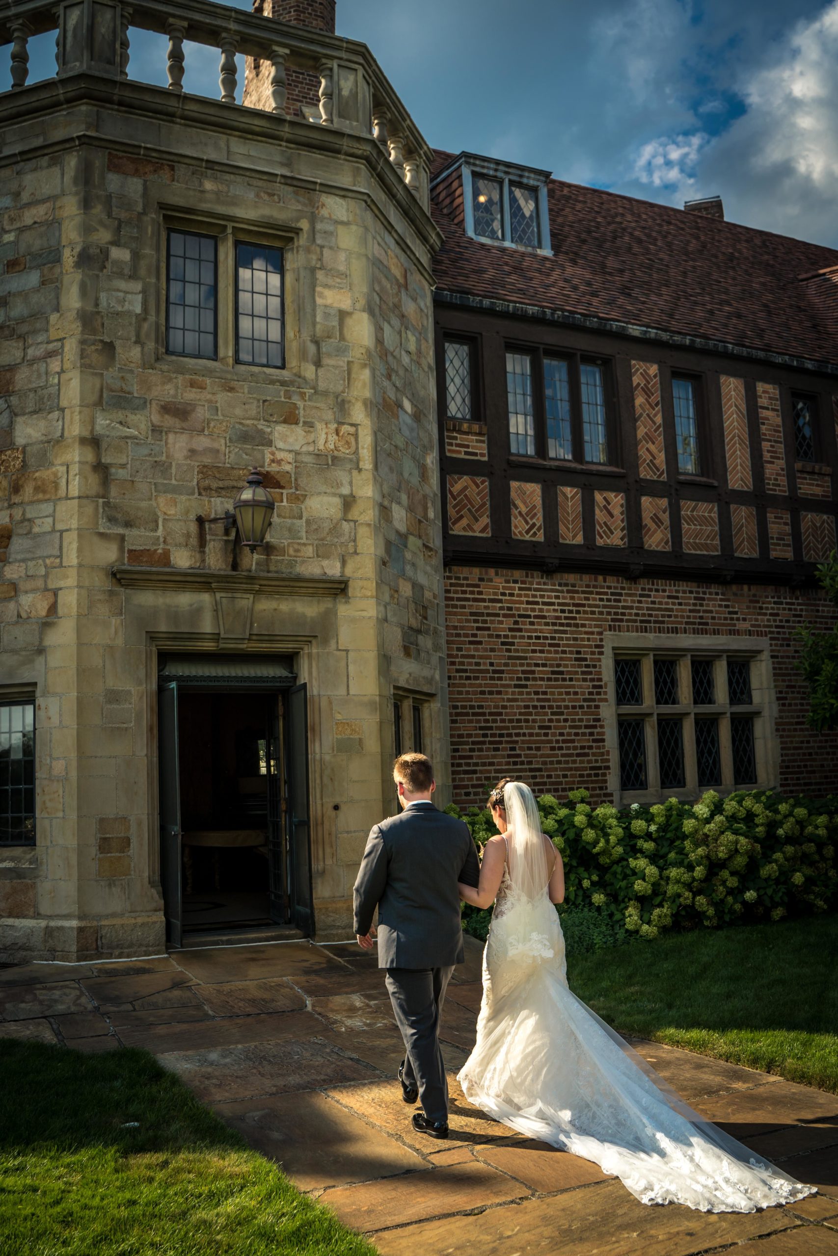 Maxson_McLoughlin meadow brook - Mike Staff Productions bride and groom walking into meadow brook