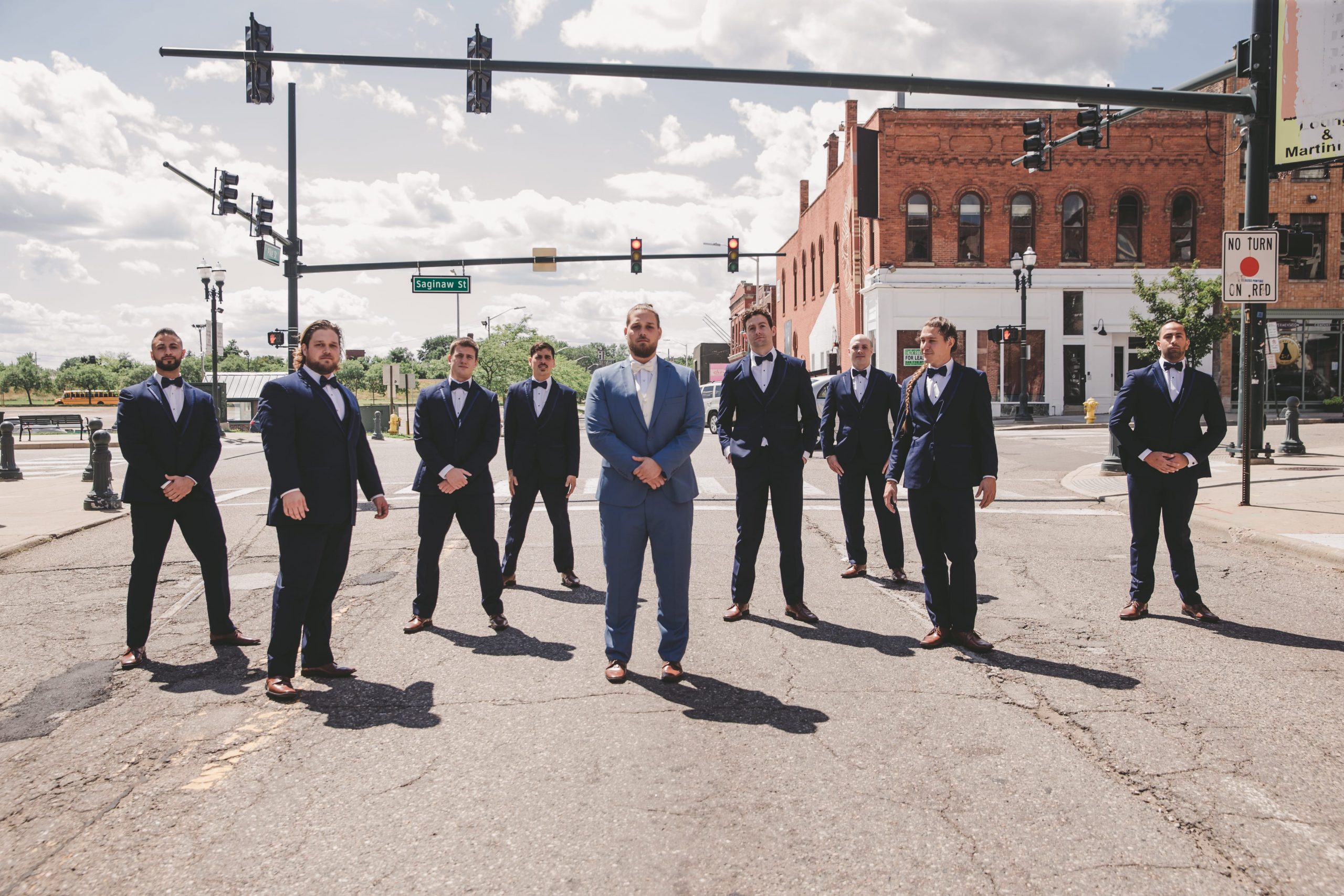 groomsmen in street