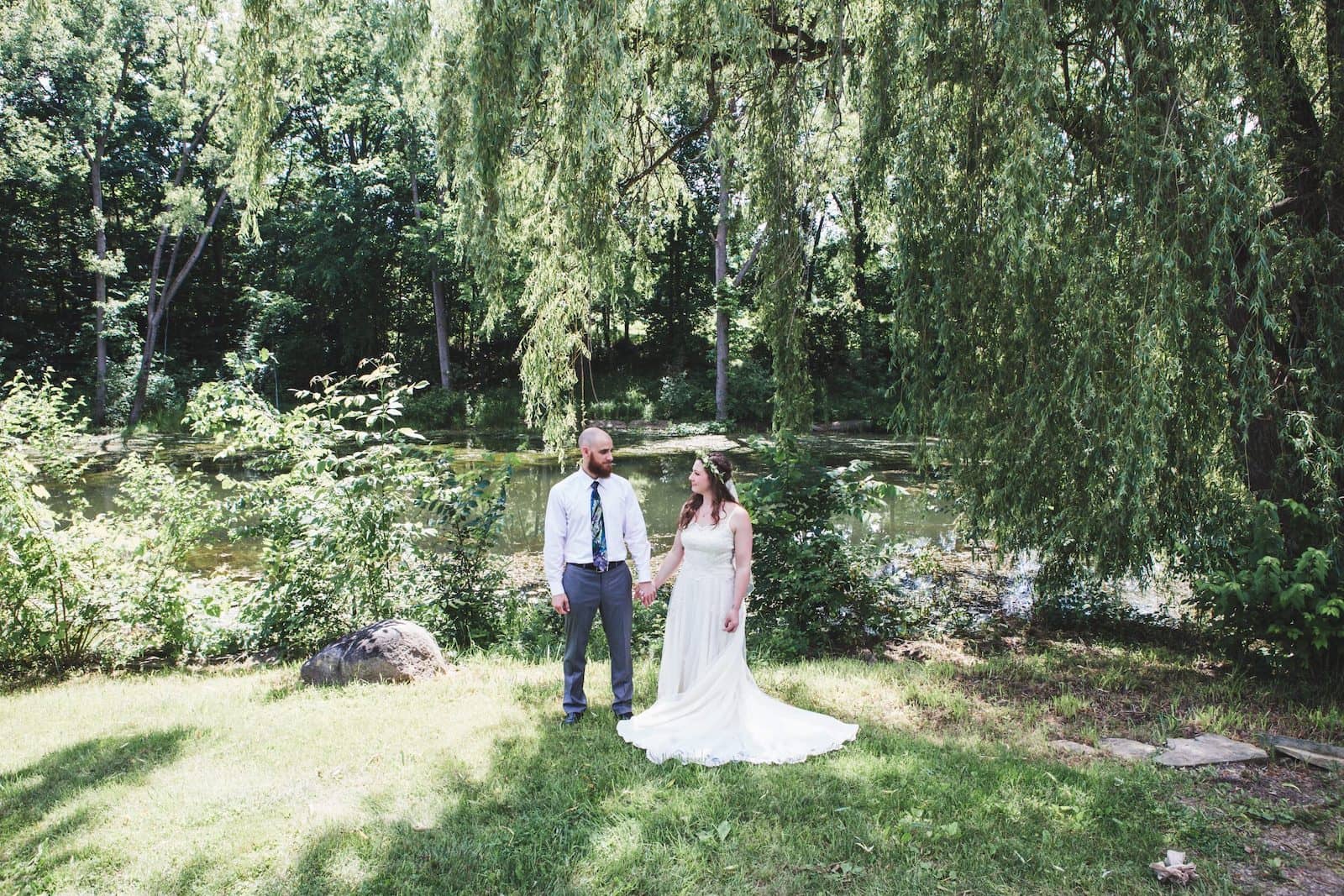 The Real Detroit Wedding of Jessica & Jason - Mike Staff Productions bride & groom holding hands