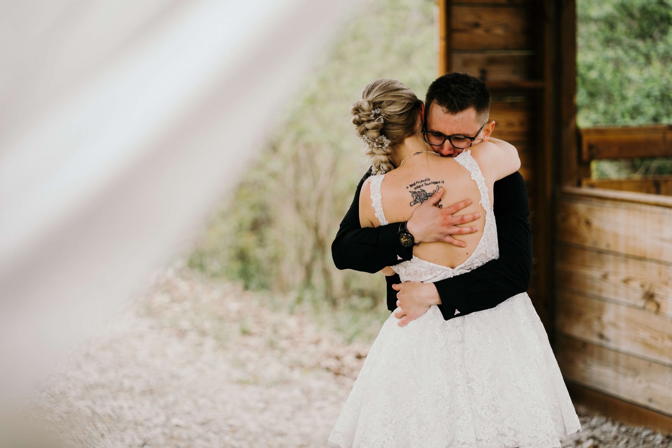 real detroit wedding jessi and tone - Mike Staff Productions bride and groom hugging