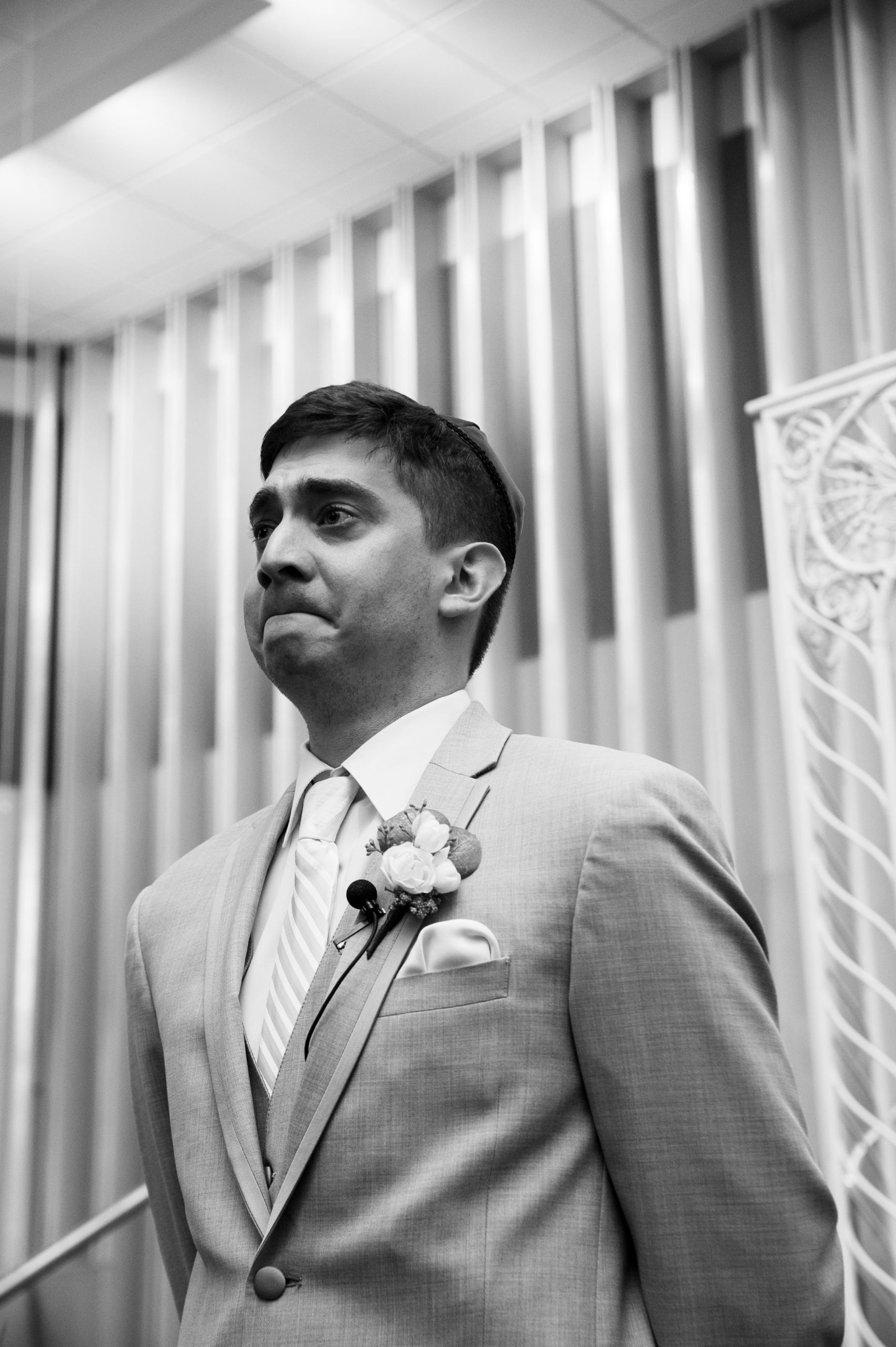 The Real Detroit Wedding of Sara and Jeffrey - Mike Staff Productions groom tearing up at alter