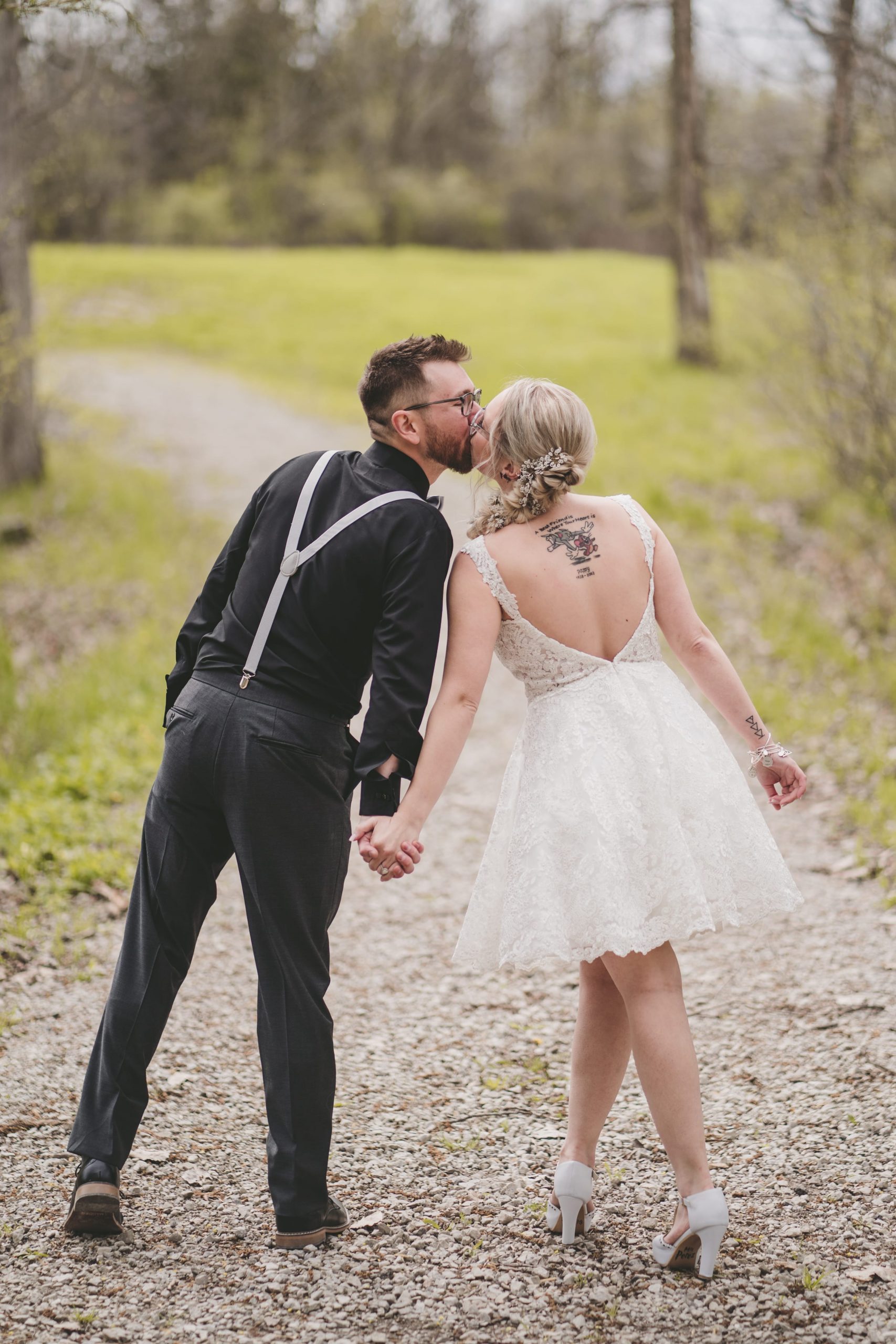 real detroit wedding jessi and tone - Mike Staff Productions bride and groom kissing