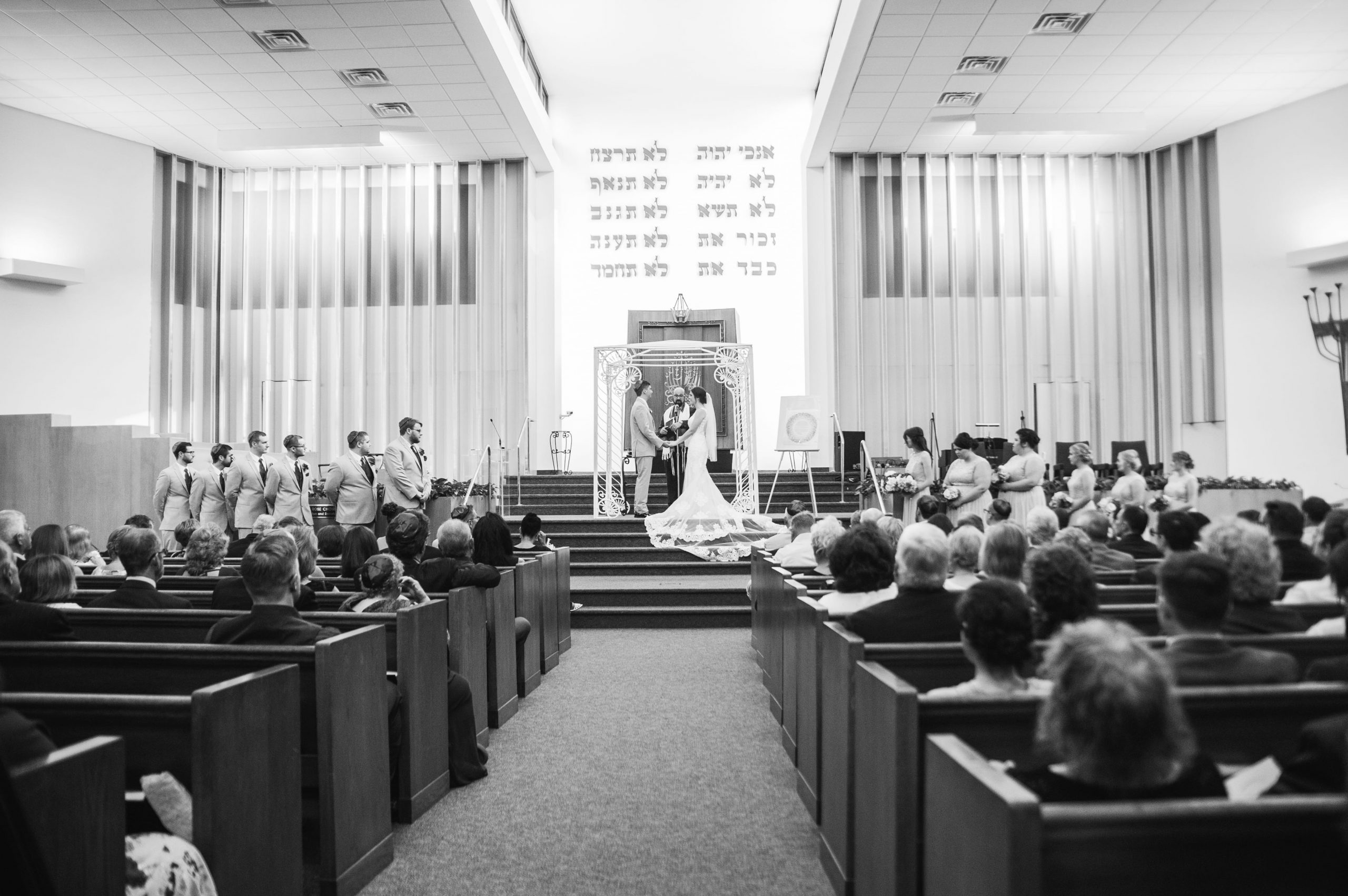 The Real Detroit Wedding of Sara and Jeffrey - Mike Staff Productions bride and groom at alter
