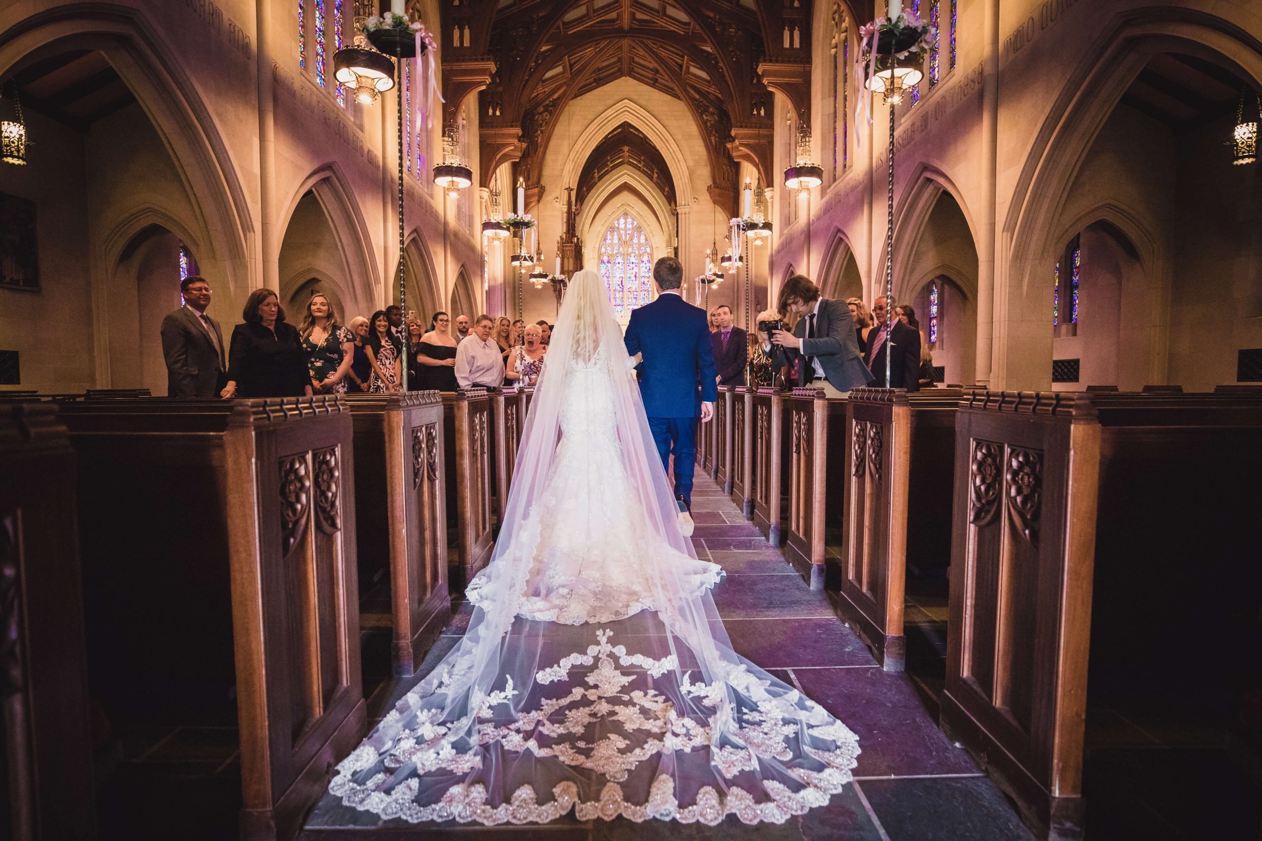 Real Detroit Wedding of Heather & John - Mike Staff Productions bride walking down aisle in beautiful church