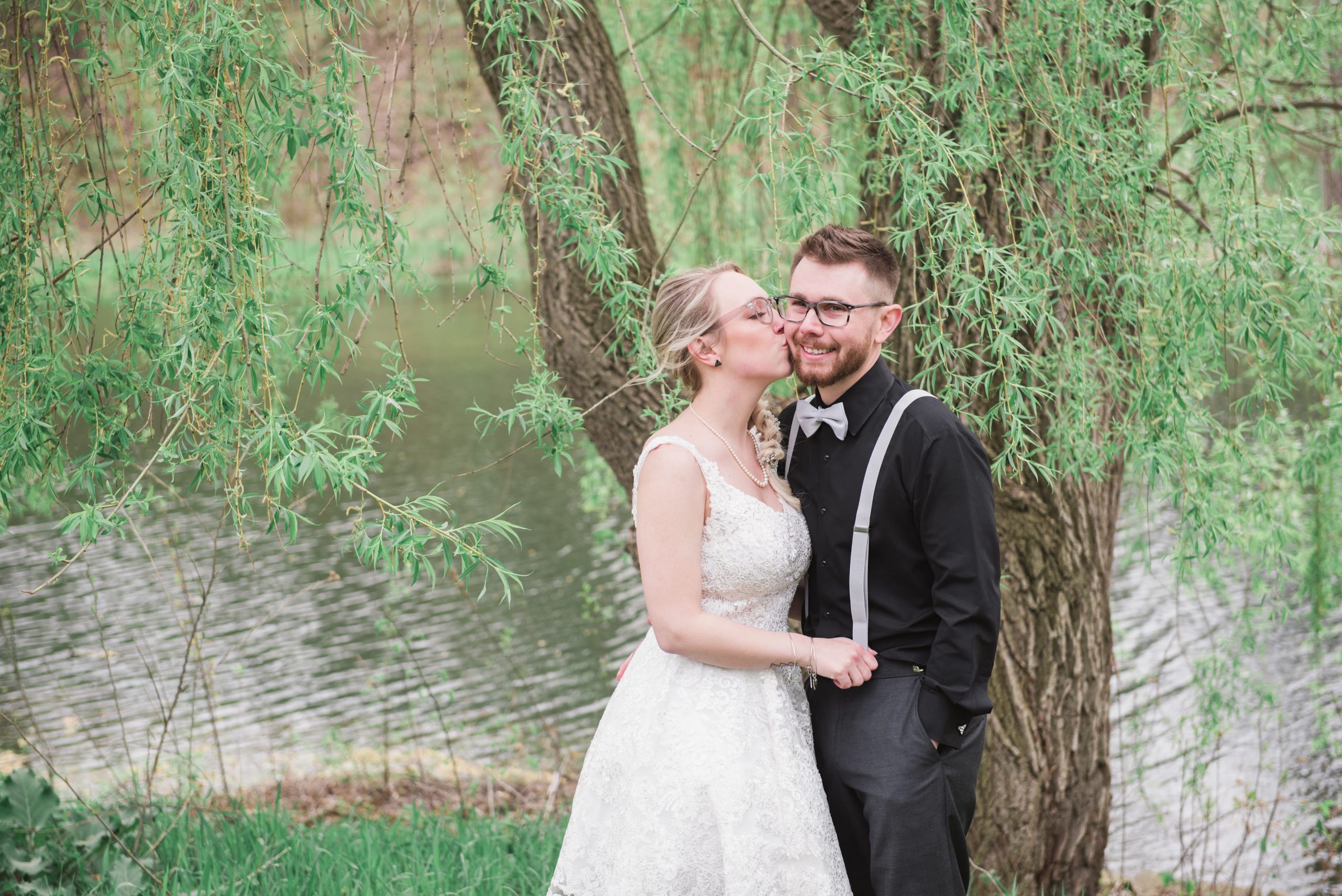 real detroit wedding jessi and tone - Mike Staff Productions bride and groom kissing