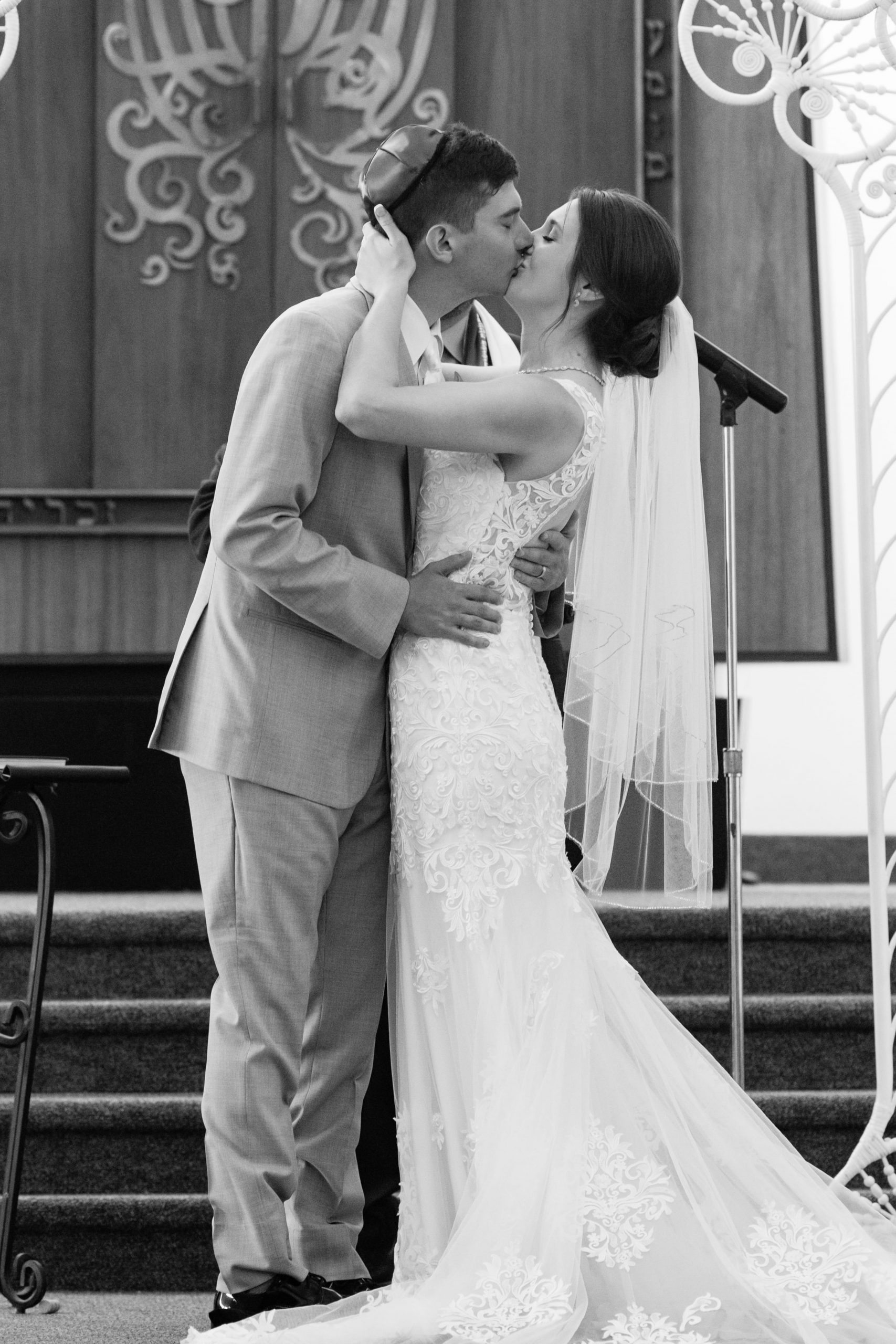 The Real Detroit Wedding of Sara and Jeffrey - Mike Staff Productions bride and groom kissing