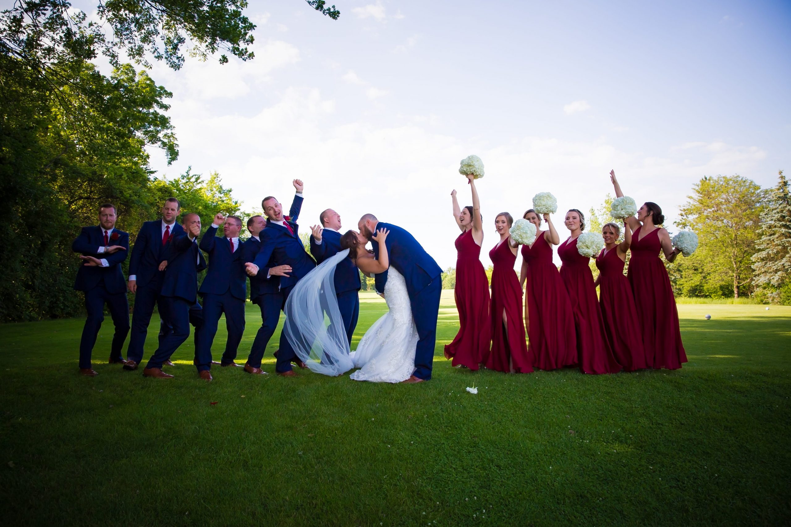 The Real Detroit Wedding of Kayla & Matthew - Mike Staff Productions red and blue bridal party