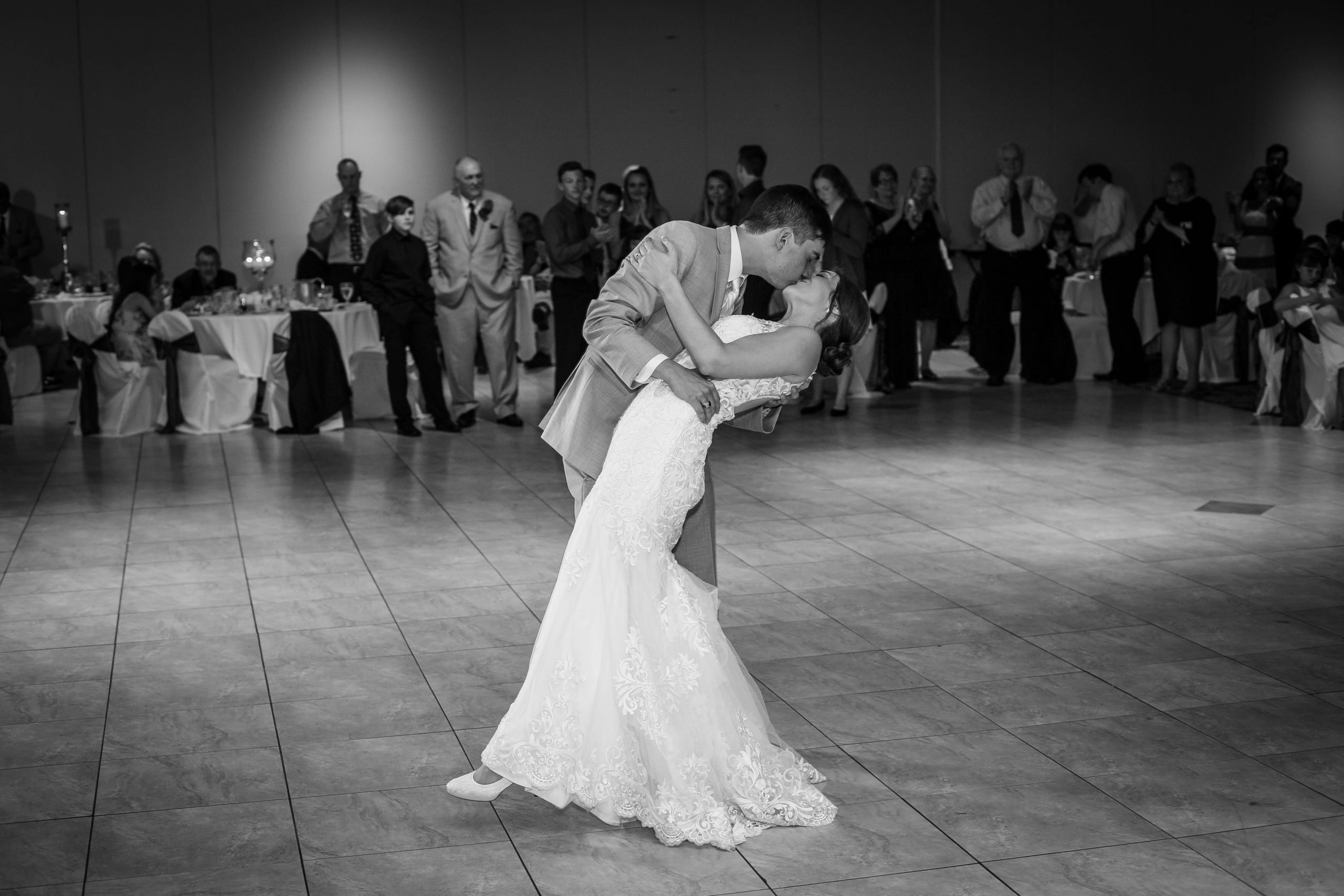The Real Detroit Wedding of Sara and Jeffrey - Mike Staff Productions groom dipping bride on dancefloor