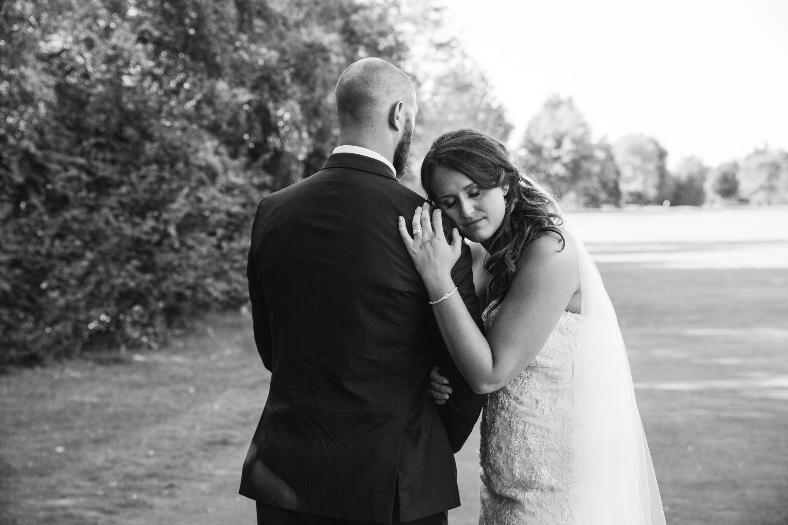 The Real Detroit Wedding of Kayla & Matthew - Mike Staff Productions bride leaning head on groom's shoulder