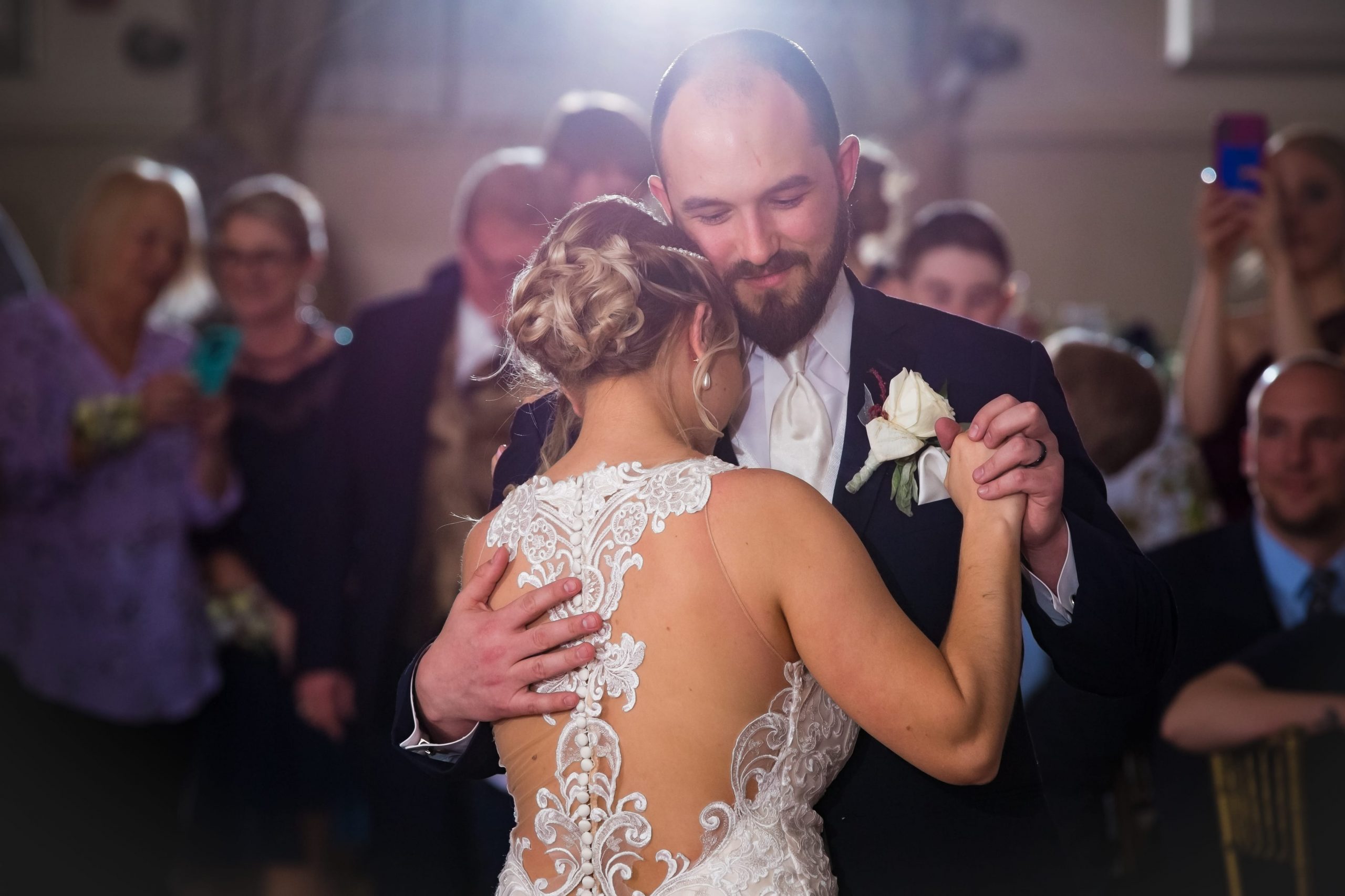 The Real Detroit Wedding of Rachel and Joe - Mike Staff Productions groom holding bride close during first dance
