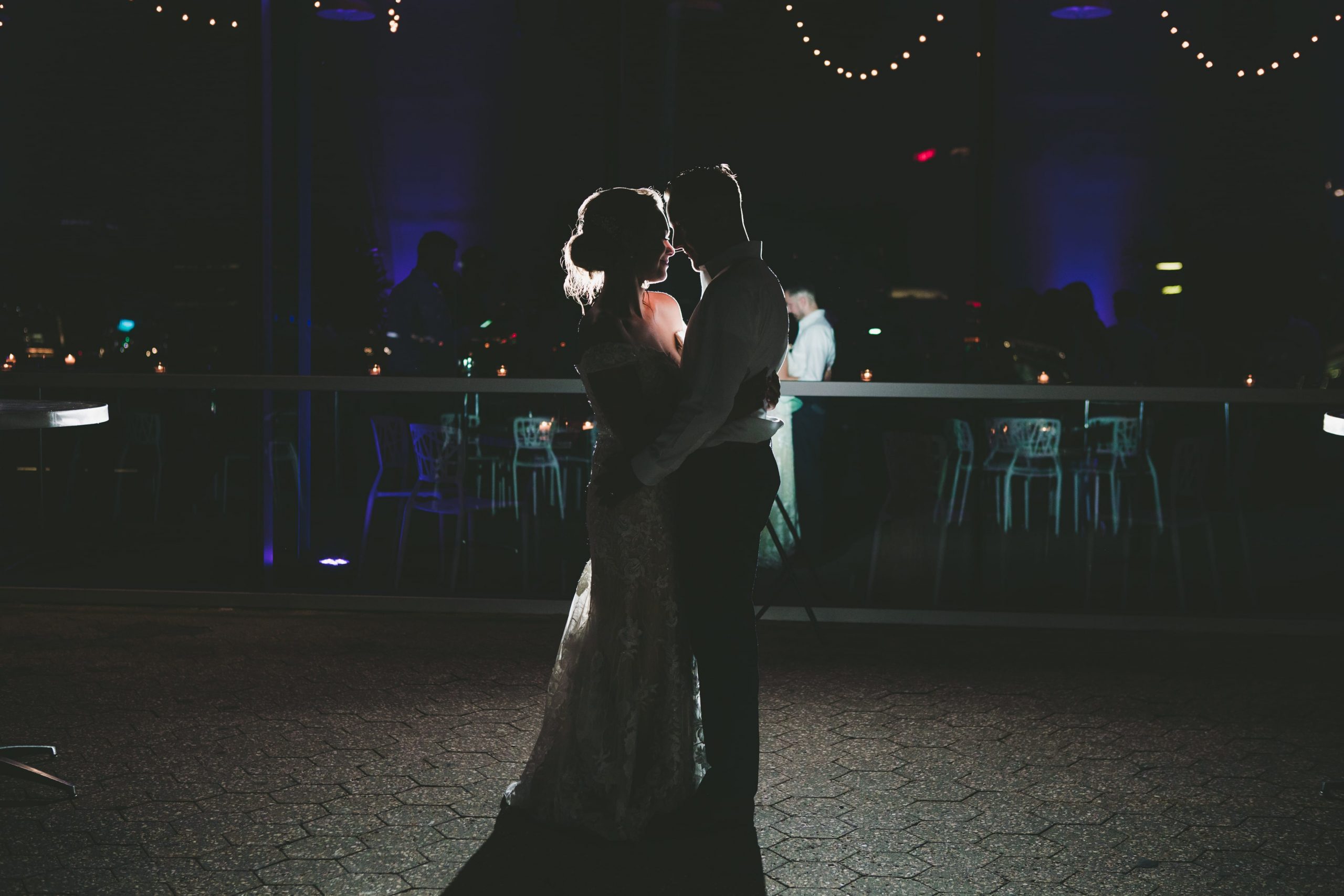 Real Detroit Wedding - Mike Staff Productions bride and groom dancing with minimal lighting
