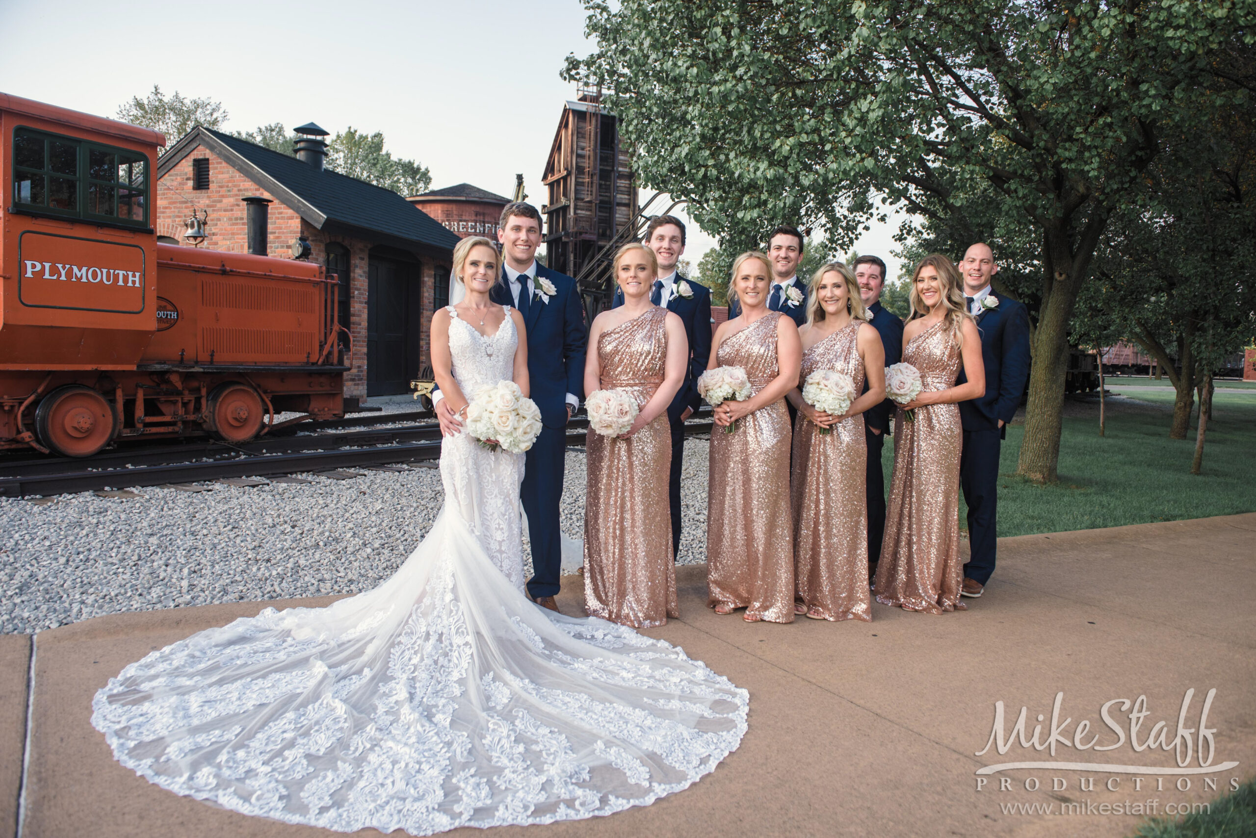 bridal party at henry ford in front of train - Mike Staff Productions bridal party at henry ford in front of train