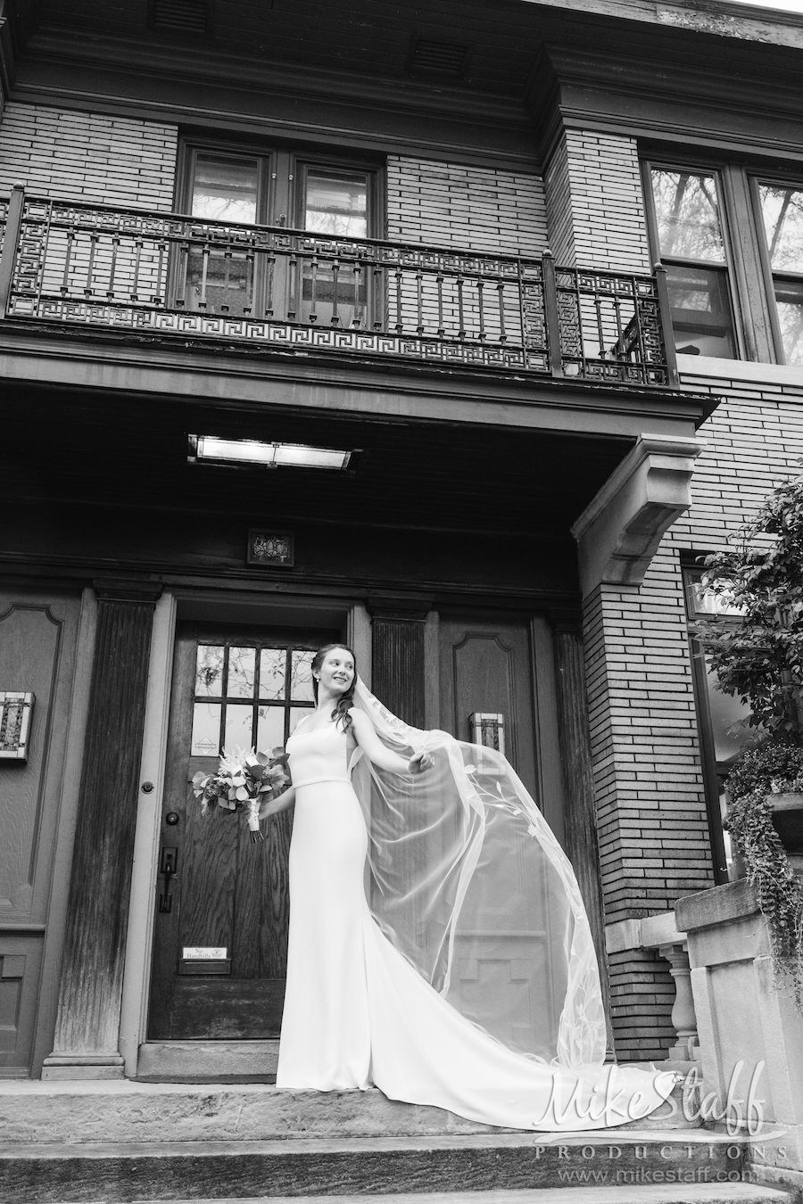 bride amanda veil flowing outside - Mike Staff Productions Amanda and Michael's Detroit whiskey factory wedding