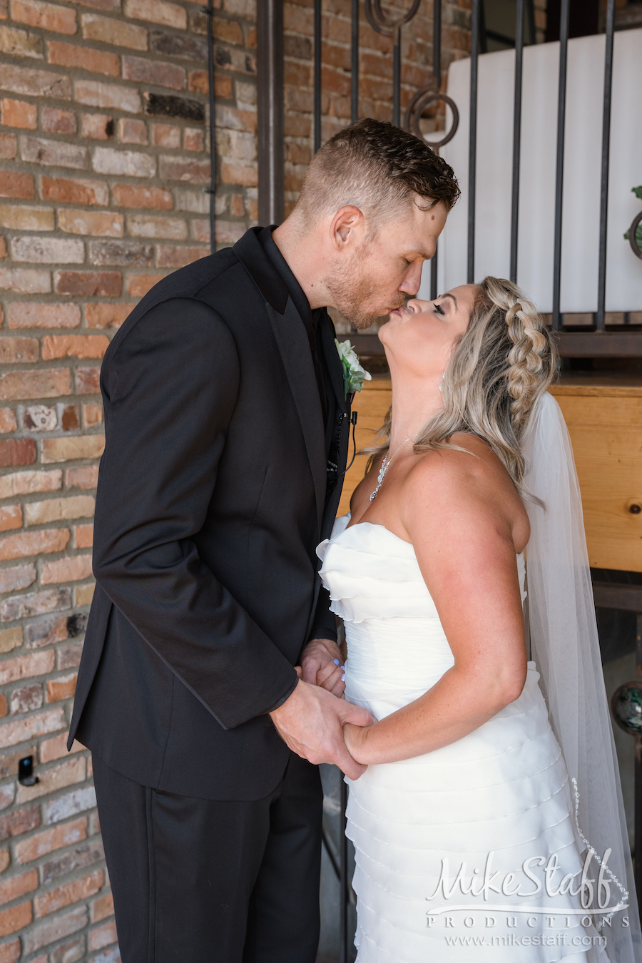 bride and groom kissing - Mike Staff Productions bride and groom kissing