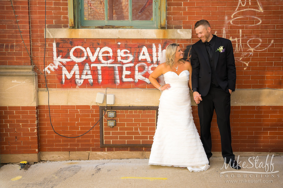 bride and groom with graffiti in pontiac - Mike Staff Productions bride and groom with graffiti in pontiac