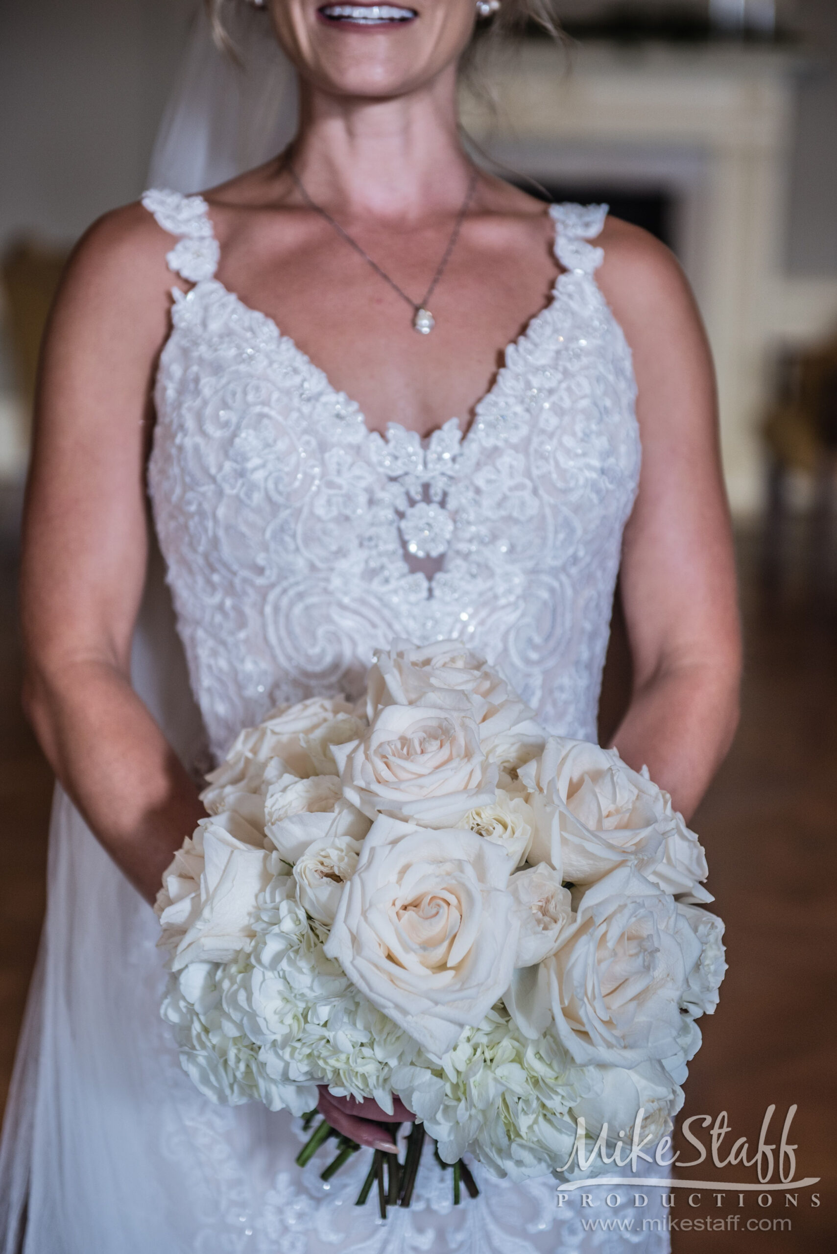 bride holding bouquet - Mike Staff Productions bride holding bouquet