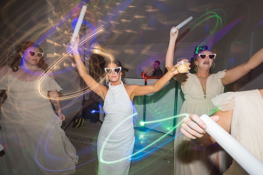 Detroit Wedding Photography at The Oakley_bride dancing with sunglasses - Mike Staff Productions - Mike Staff Productions Detroit-Wedding-Photography-at-The-Oakley_bride-dancing-with-sunglasses