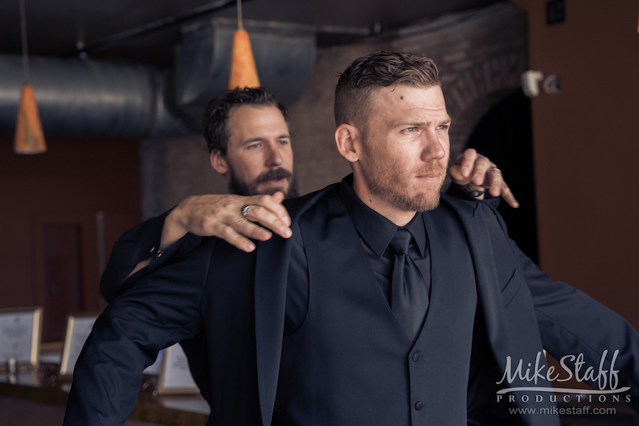 groom getting tux on - Mike Staff Productions groom getting tux on