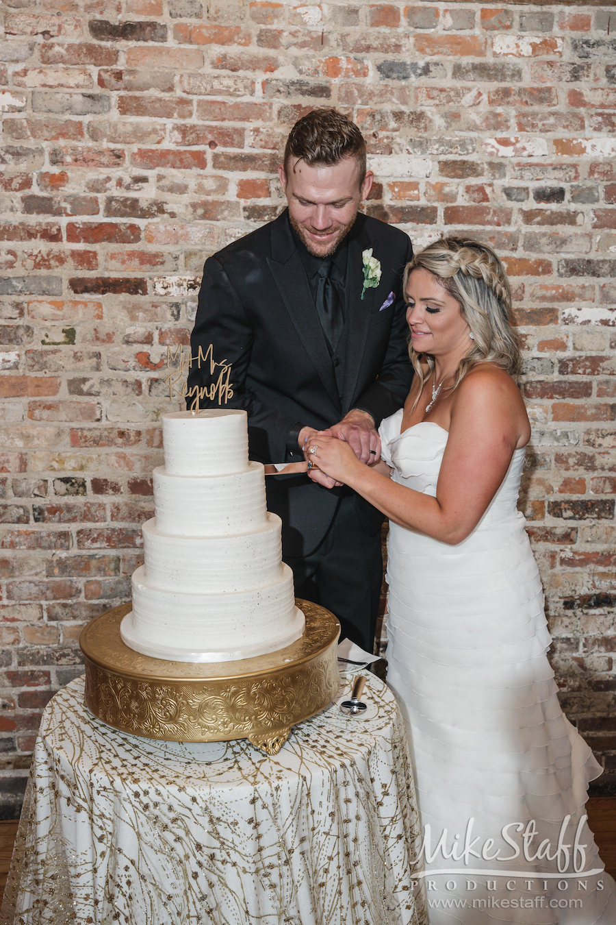 jamie and stephen cutting their wedding cake - Mike Staff Productions jamie and stephen cutting their wedding cake
