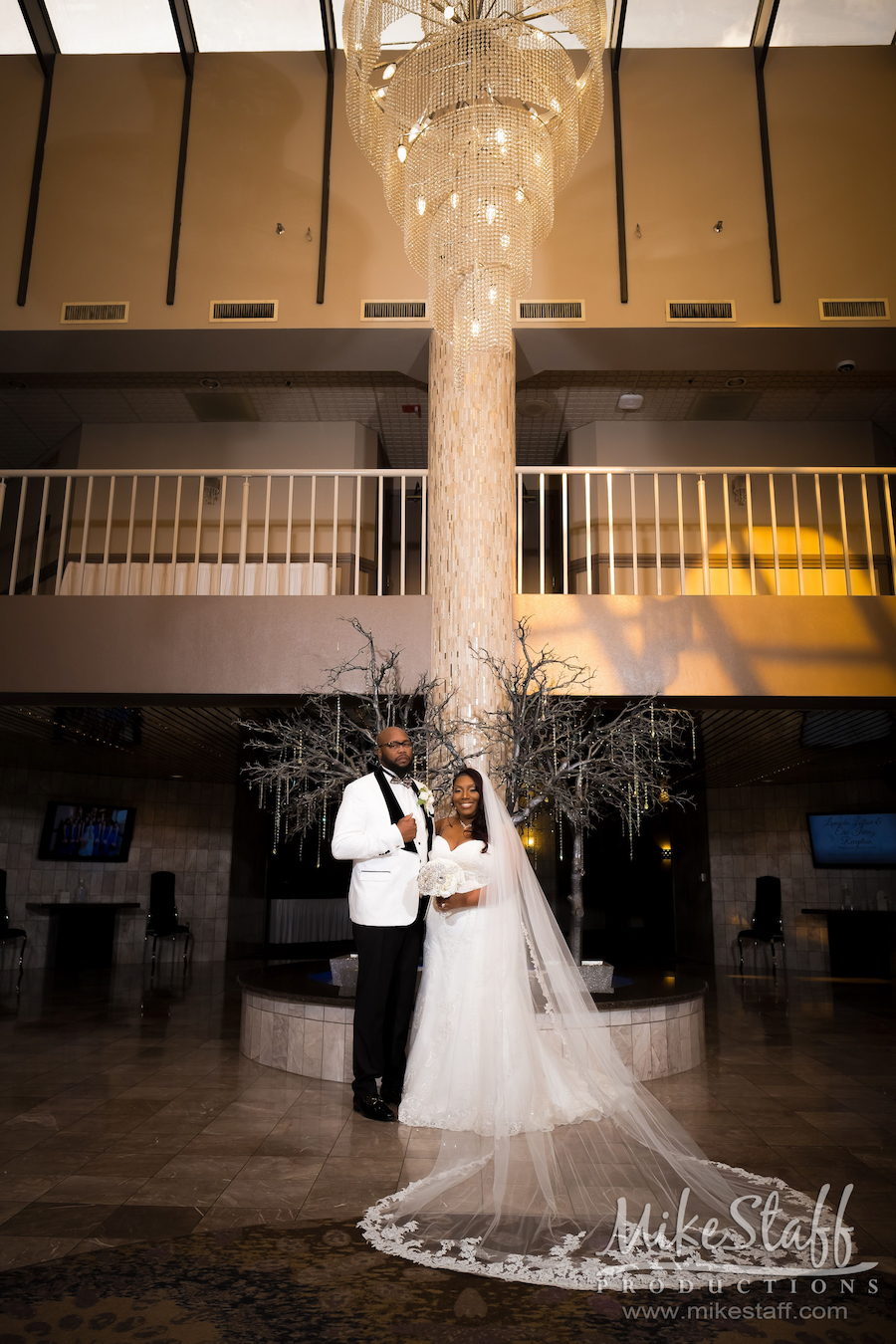 Lomyda and Eric under laurel manor chandelier - Mike Staff Productions Lomyda and Eric under laurel manor chandelier