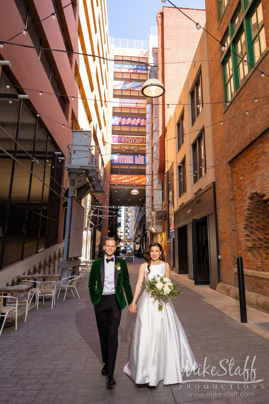 mikestaff-14 - Mike Staff Productions the belt downtown detroit bride and groom holding hands