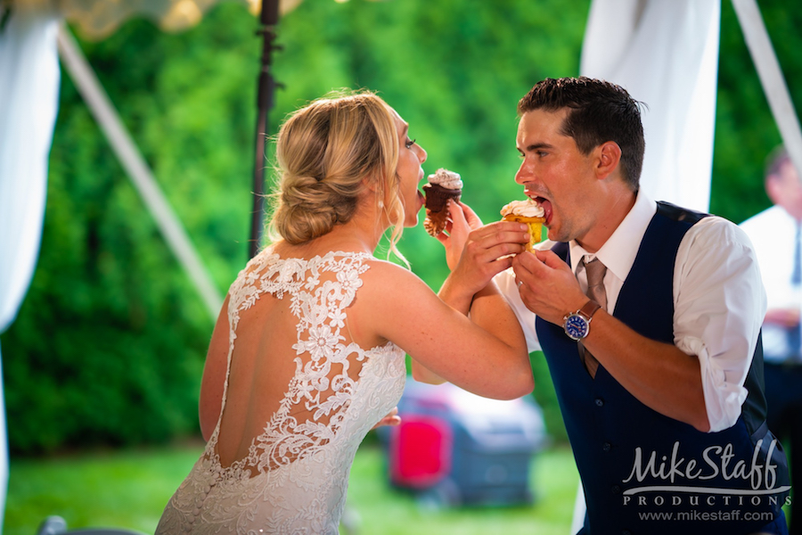 mikestaff-20 - Mike Staff Productions bride and groom eating cupcakes