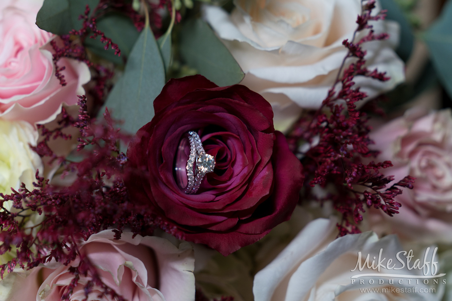mikestaff-36 - Mike Staff Productions dezarae and charles wedding rings in flowers