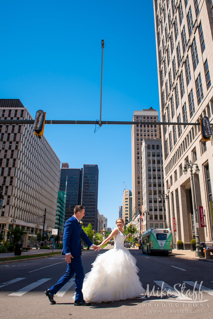 mikestaff-9 - Mike Staff Productions bride and groom crossing street in detroit