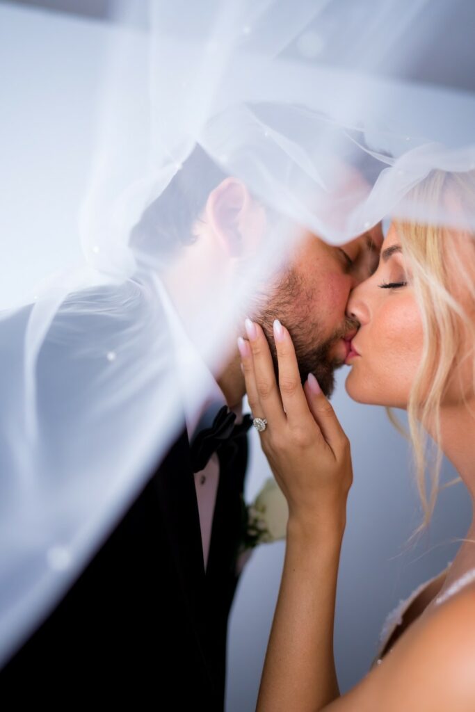 Villa Penna Wedding Photography_veil flowing over the bride and groom - Mike Staff Productions - Mike Staff Productions Villa Penna Wedding Photography_veil flowing over the bride and groom wedding videography
