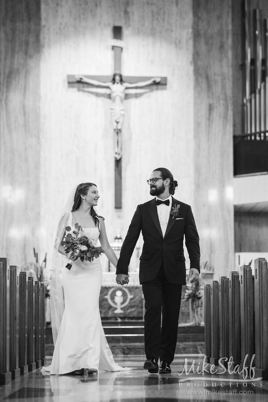 walking down the aisle black and white - Mike Staff Productions Amanda and Michael's Detroit whiskey factory wedding