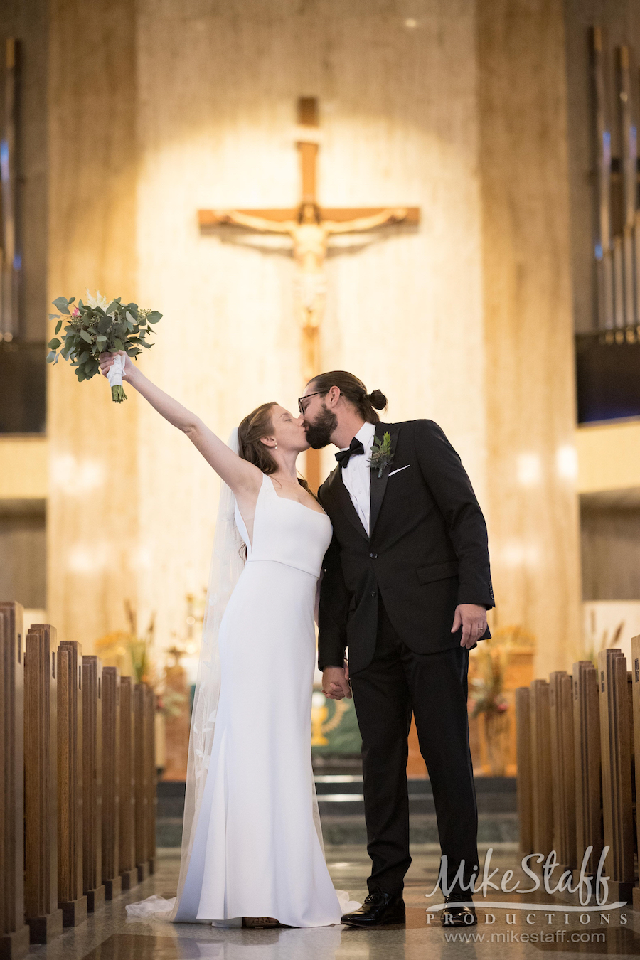 wedding ceremony kiss church - Mike Staff Productions Amanda and Michael's Detroit whiskey factory wedding