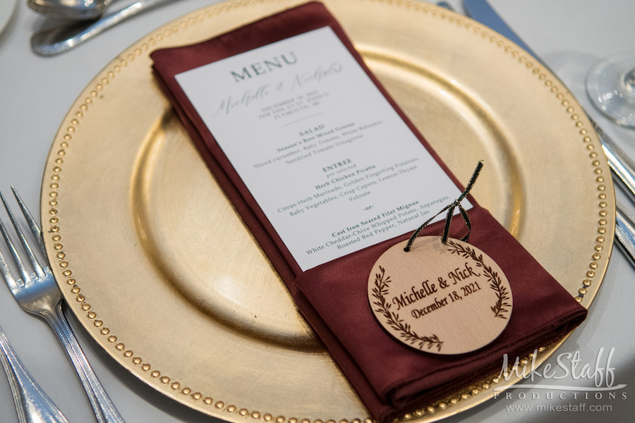 wedding menu on gold charger plate - Mike Staff Productions wedding menu on gold charger plate